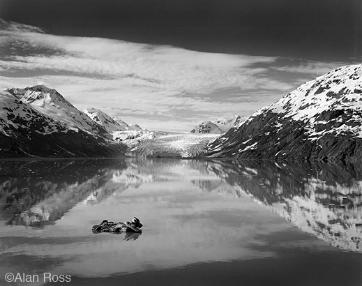 "Clouds and Reflections, Glacier Bay" fine print, at Sun to Moon Gallery